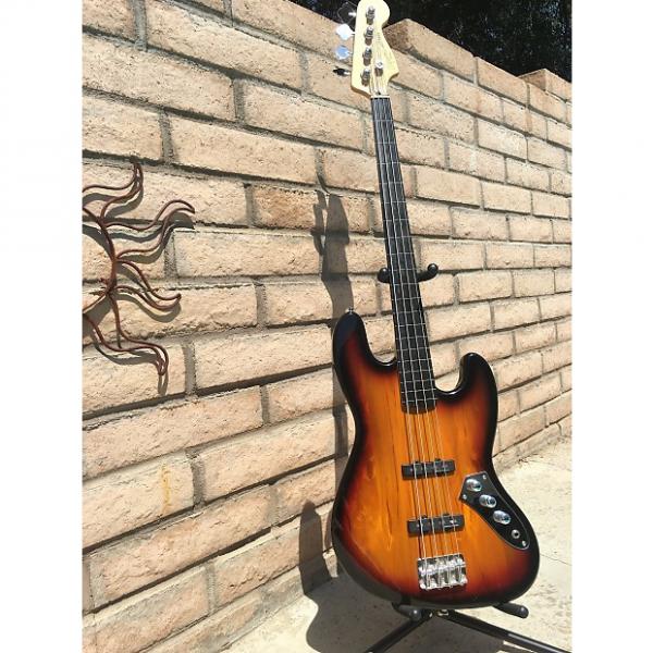 Custom Squier by Fender Fretless Jazz Bass 2009 3 Tone Sunburst #1 image