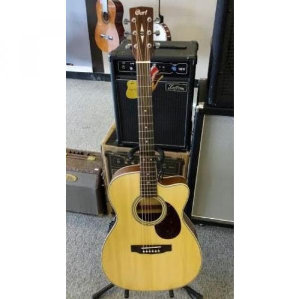 Cort L100 OC Acoustic Electric Guitar Fishman Pickup and Tuner Solid Spruce Top #1 image